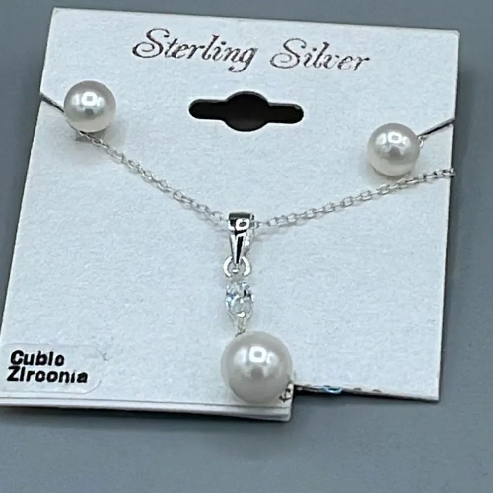 Sterling silver cubic Zirconia faux pearl necklace set.